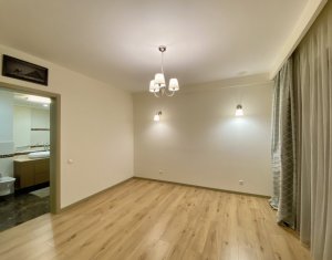 Apartament 3 camere, 109 mp, 2 balcoane si garaj, partial mobilat, zona Europa