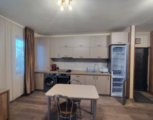 Apartament cu doua camere, balcon,terasa si parcare inclusa