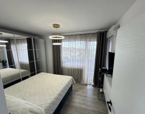Apartament 2 dormitoare + living cu bucatarie open space + 2 balcoane